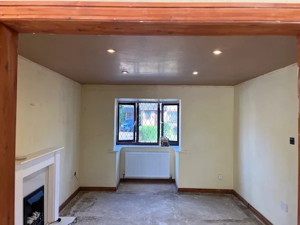 Dry lining and plasterboarding installation in progress